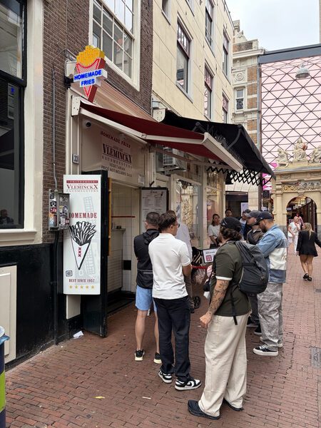 Under the awning: the Best since 1957 panel beside the counter while the queue orders